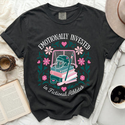 Black t-shirt with "Emotionally Invested in Fictional Athletes" text and hockey graphic.