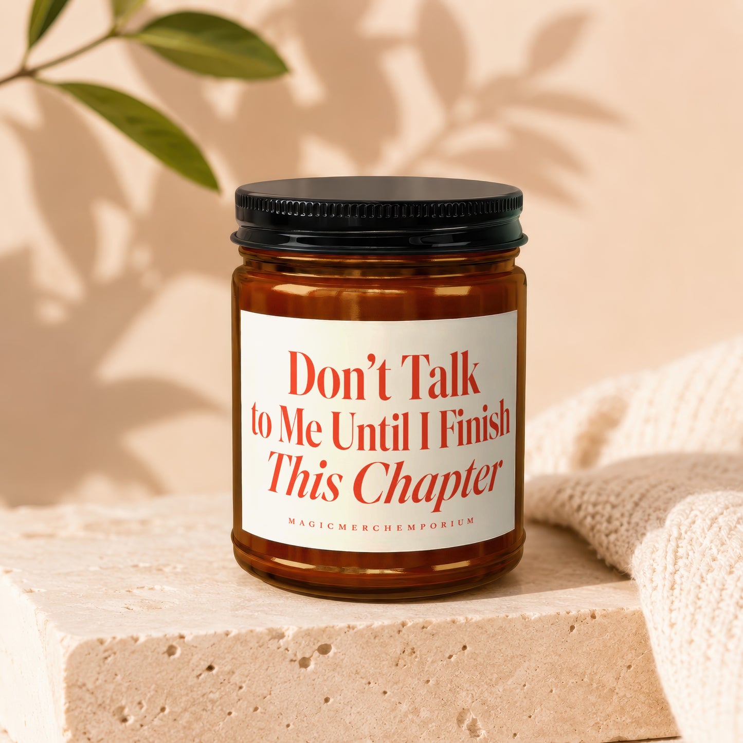 Amber jar candle with black lid, featuring text "Don't Talk to Me Until I Finish This Chapter".