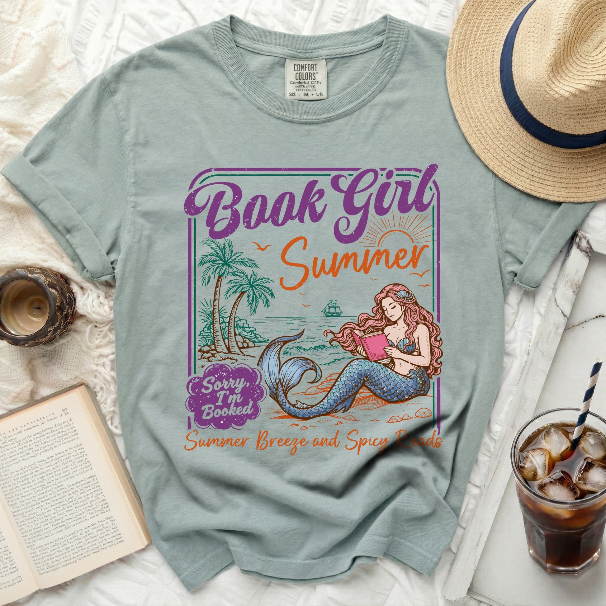 Light blue t-shirt with "Book Girl Summer" and a mermaid.