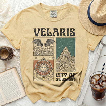 Velaris City of Starlight graphic t-shirt with bat and mountain designs.