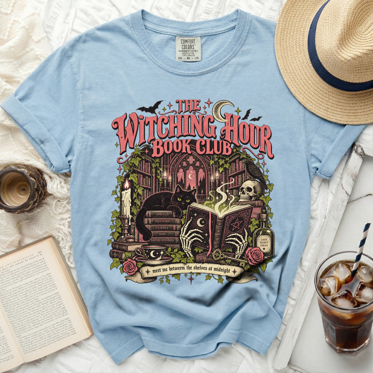 Light blue t-shirt with "The Witching Hour Book Club" gothic design.