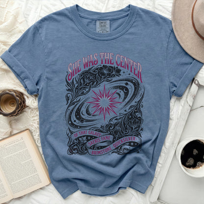 Blue Comfort Colors t-shirt with "She Was the Center of that Galaxy" text design.
