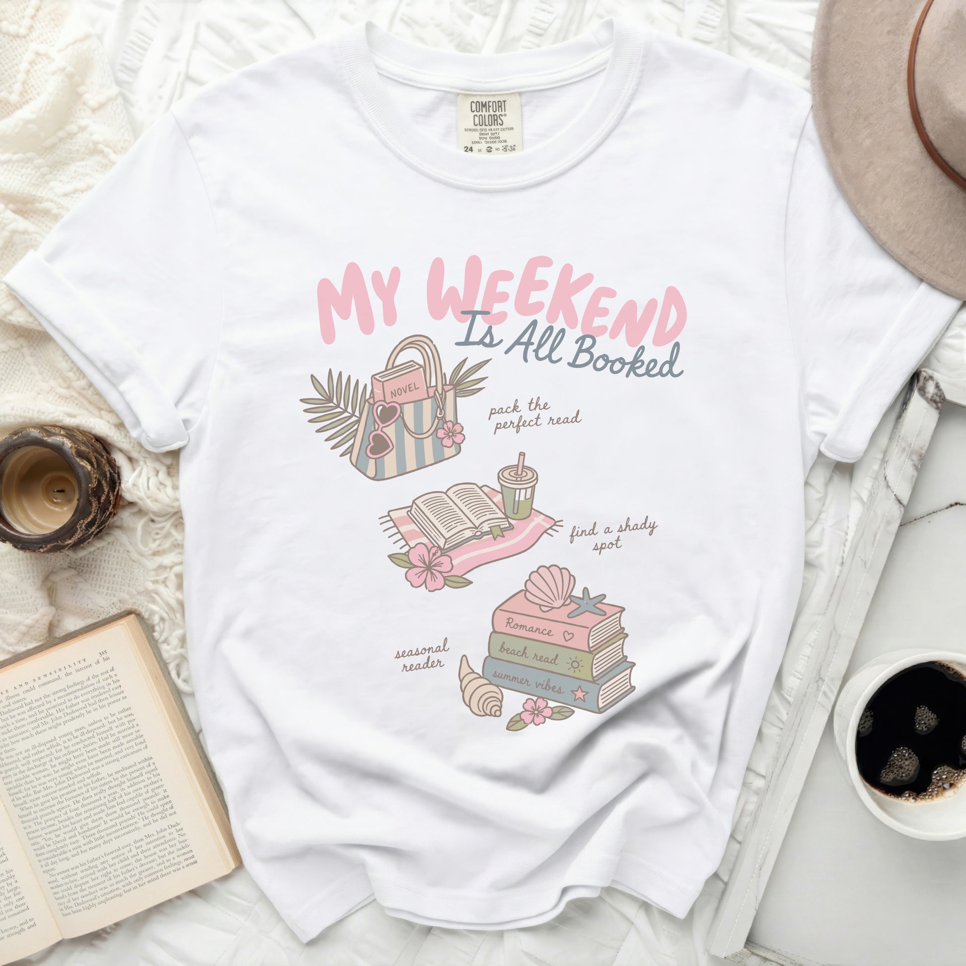 T-shirt with "My Weekend Is All Booked" and reading-themed graphics.