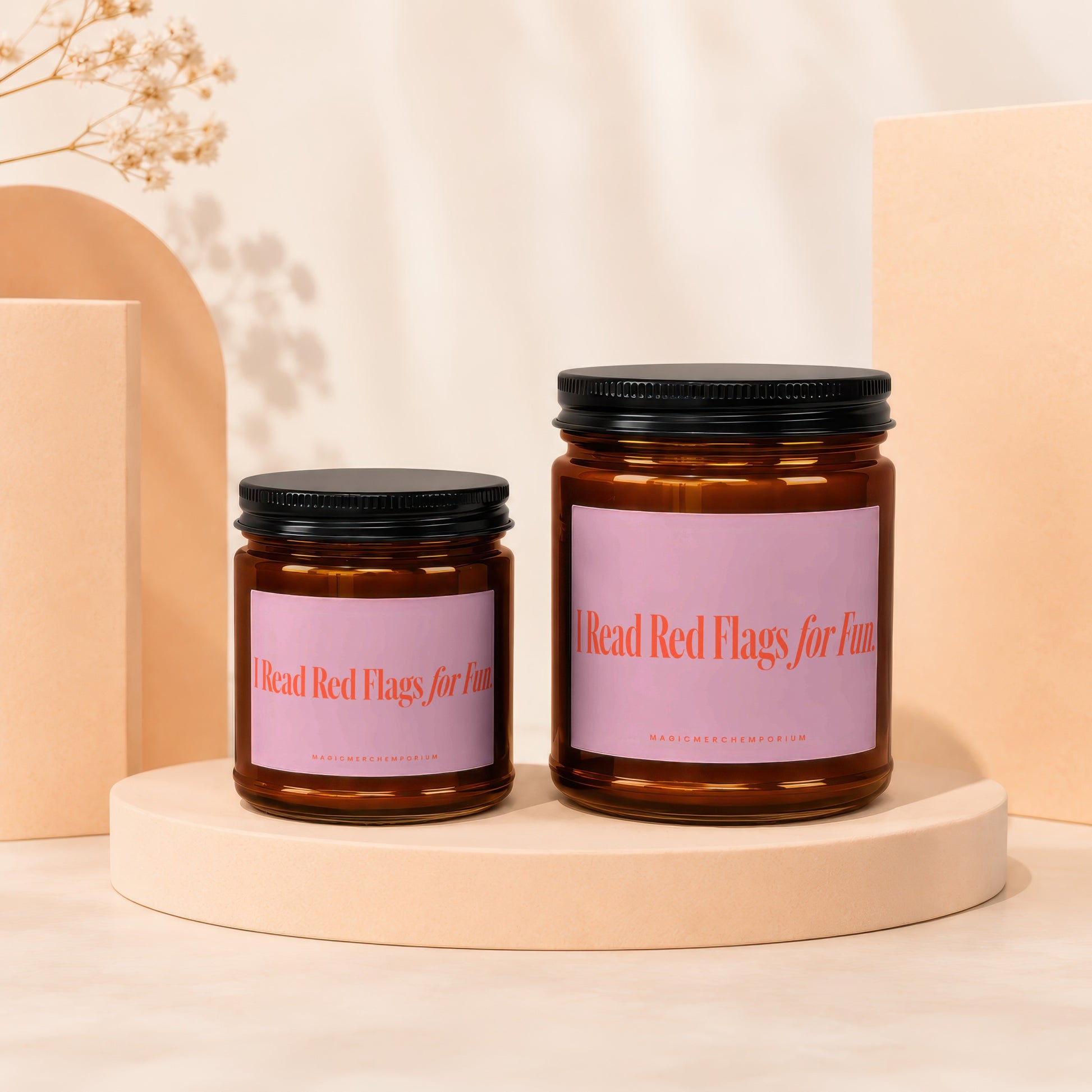 Two amber jars with black lids display pink labels that read "I Read Red Flags for Fun."