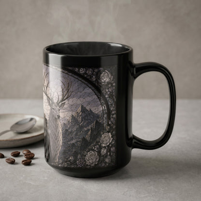 Black mug with detailed stag, mountains, and floral art.