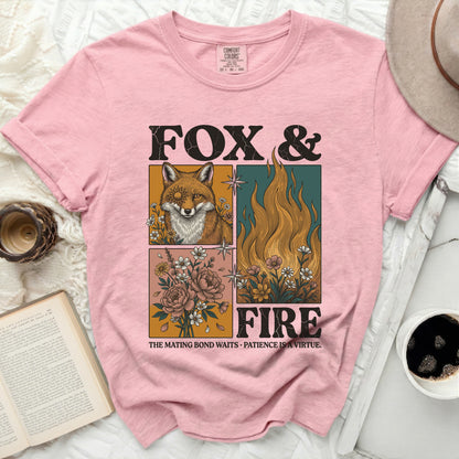 Pink t-shirt with "Fox & Fire" graphic and text "The Mating Bond Waits Patience is a Virtue."