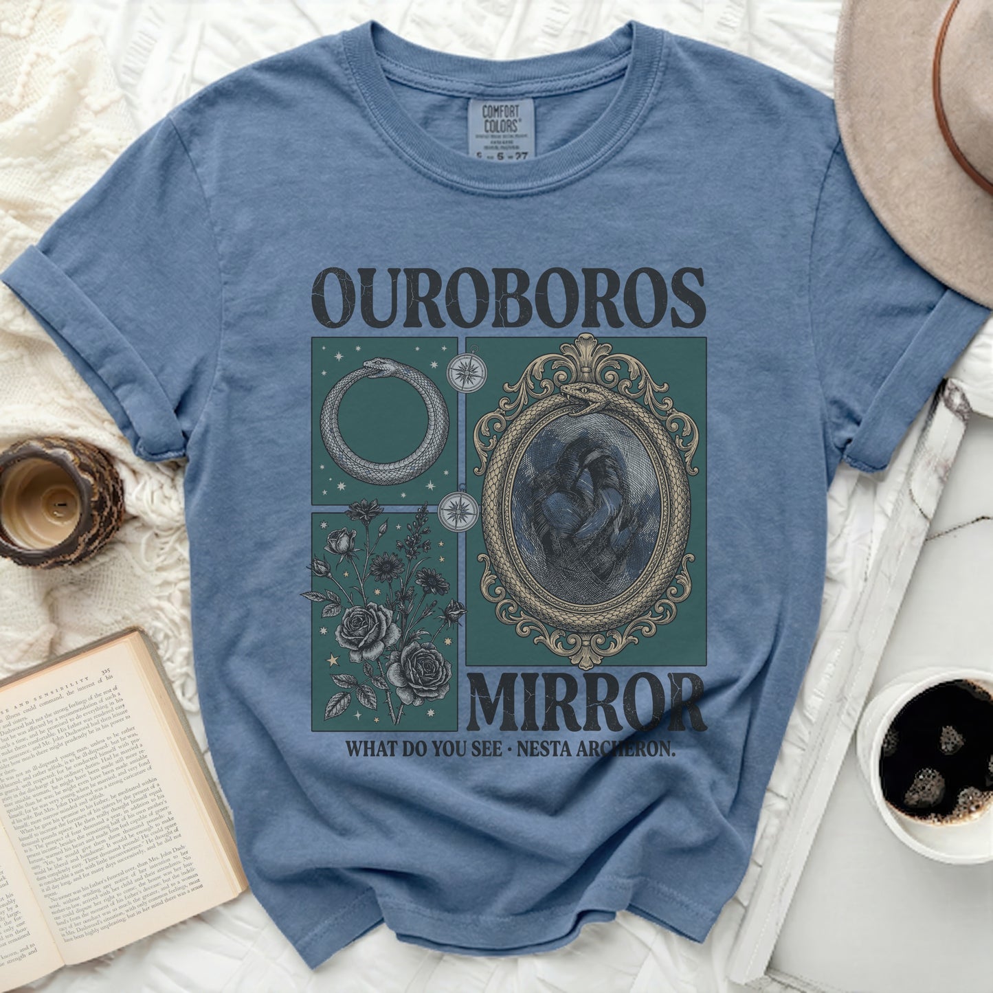 Blue t-shirt with "Ouroboros Mirror What Do You See Nesta Archeron" graphic.