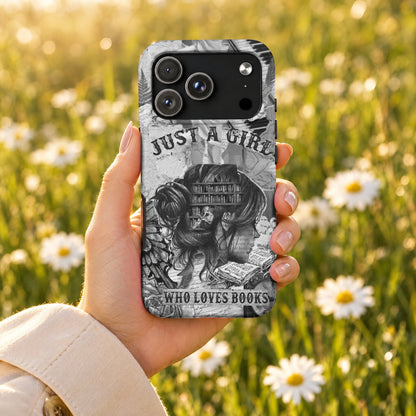 A hand holds a black and white phone case featuring a collage of text and a woman with books in her hair, against a blurry field of daisies.