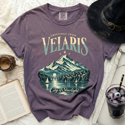 Greetings from Velaris City of Starlight t-shirt with mountains and sailboats.