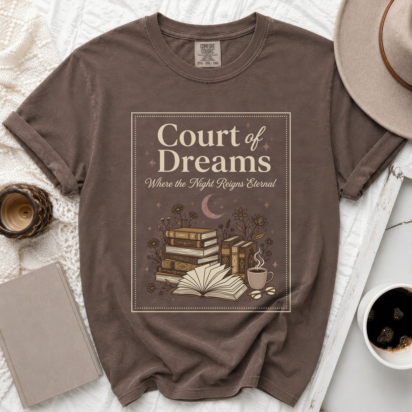 Brown t-shirt with "Court of Dreams" design featuring books, moon, and coffee cup.