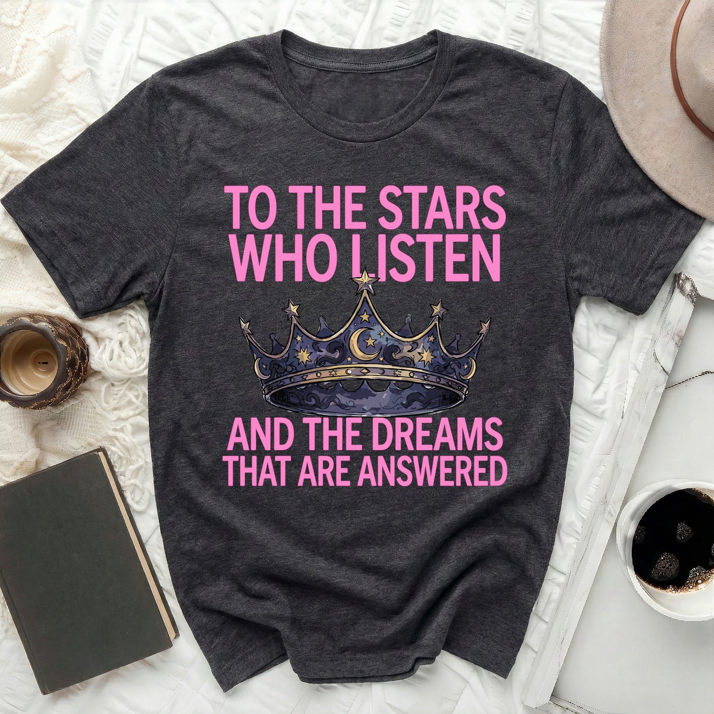 TO THE STARS WHO LISTEN AND THE DREAMS THAT ARE ANSWERED product type
Stars Who Listen
Dreams Answered
Crown Graphic
Celestial Design
Pink Lettering
Moon Stars
Fantasy Quote
Inspirational Tee
Unique Design
Bookish Quote
Gift Idea
Women's Apparel
Dark Grey Shirt
Graphic Novelty
Spiritual Theme
Hopeful Message
Queen Crown
Cosmos Inspired
Literary Fan
Quote Shirt