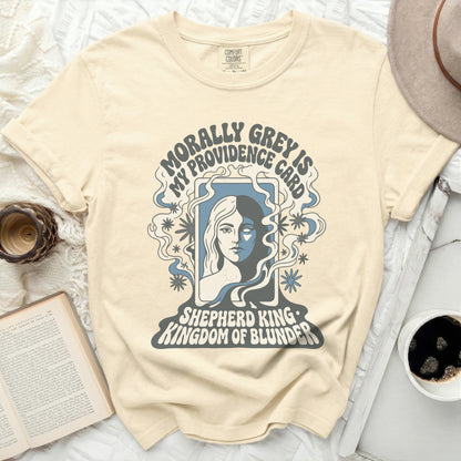Cream t-shirt with "Morally Grey My Providence Card" and "Shepherd King Kingdom of Blunder" text.