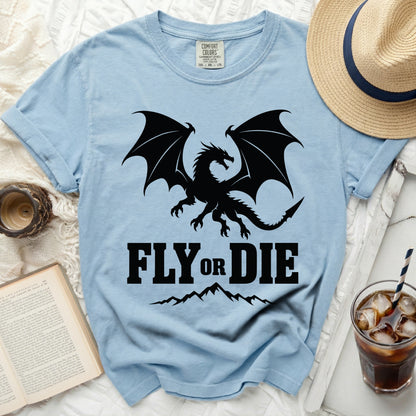 Light blue t-shirt with black dragon graphic and "Fly Or Die" text.