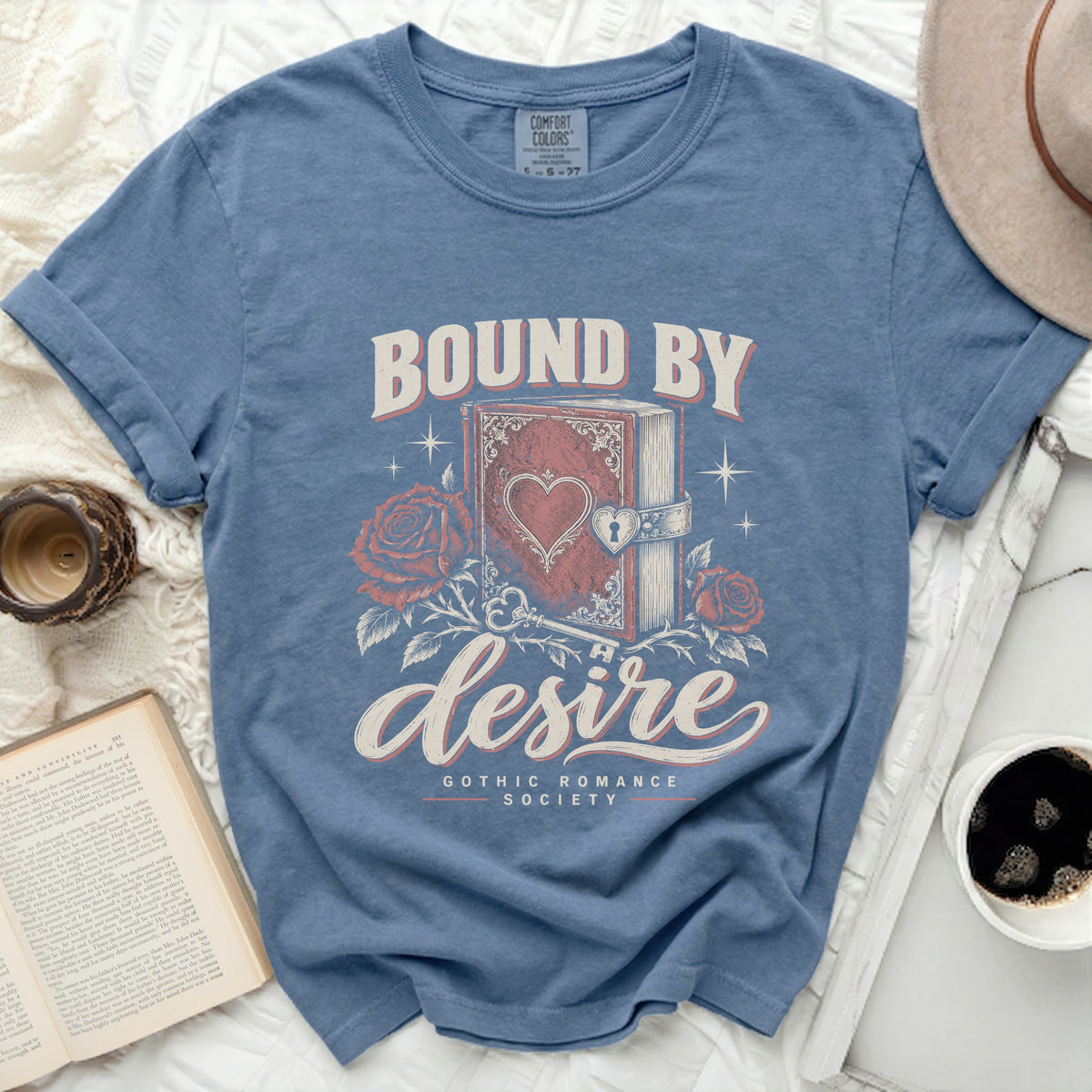 Blue t-shirt with "Bound By Desire Gothic Romance Society" text and illustration.
