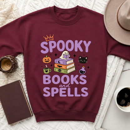 Burgundy sweatshirt with "Spooky Books and Spells" Halloween-themed graphic.