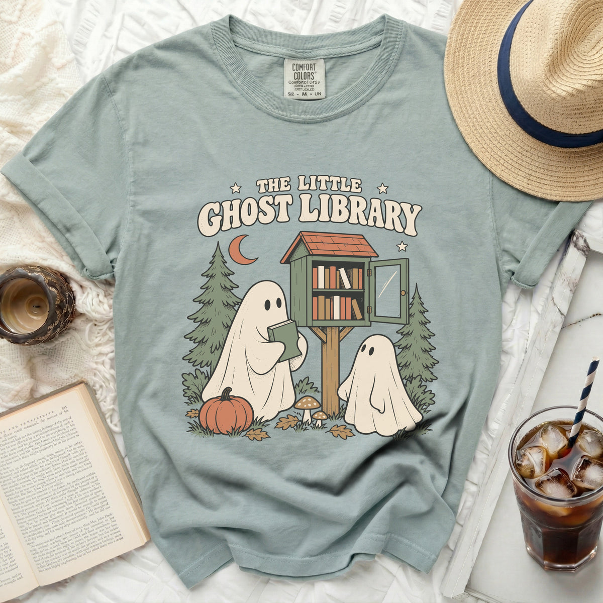 The Little Ghost Library graphic tee with two ghosts and a library.