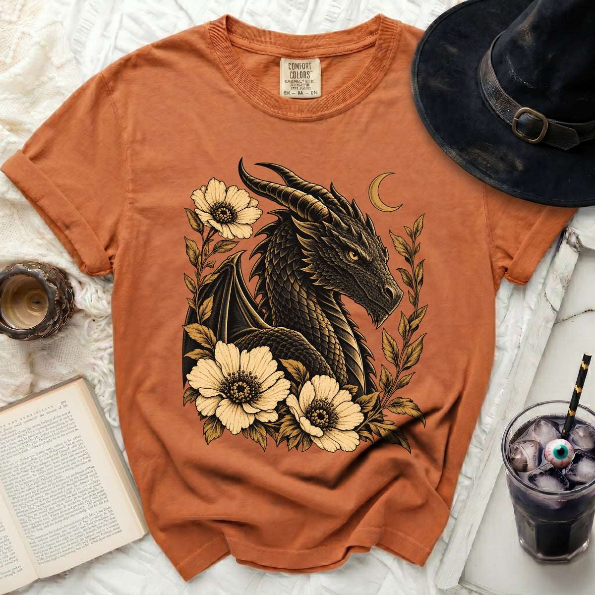 Orange t-shirt with black dragon and floral design, comfort colors label.