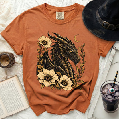 Orange t-shirt with black dragon and floral design, comfort colors label.