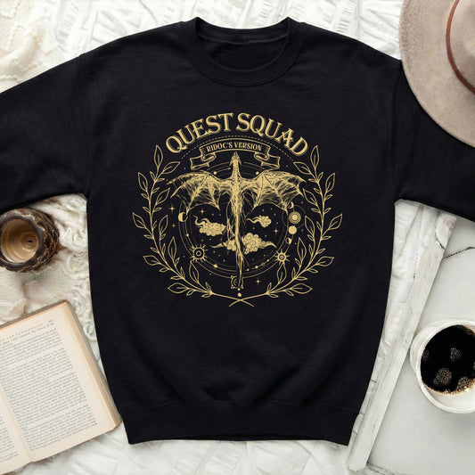 Black sweatshirt with gold "Quest Squad Ridoc's Version" dragon graphic.