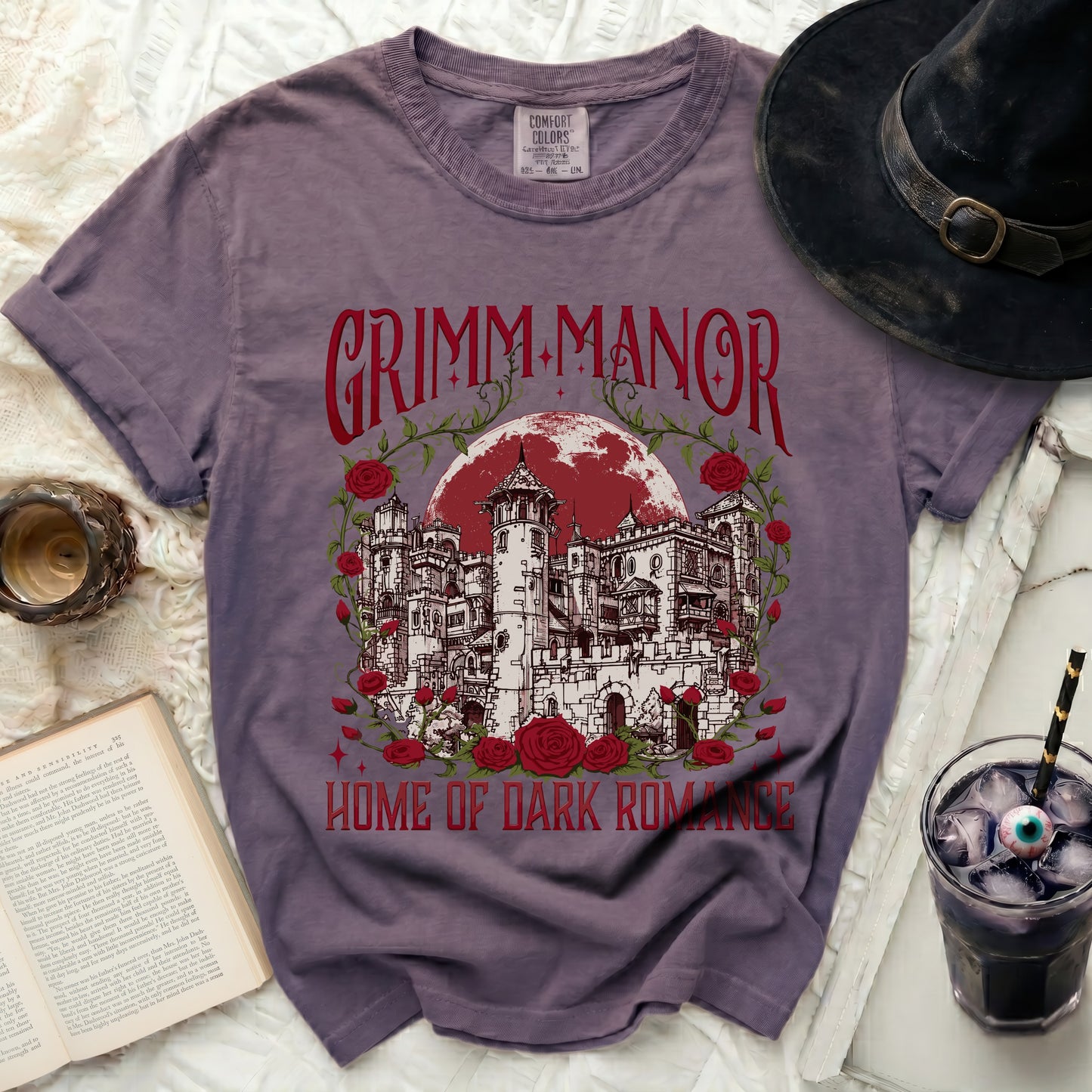 Grimm Manor Home of Dark Romance t-shirt with castle design.