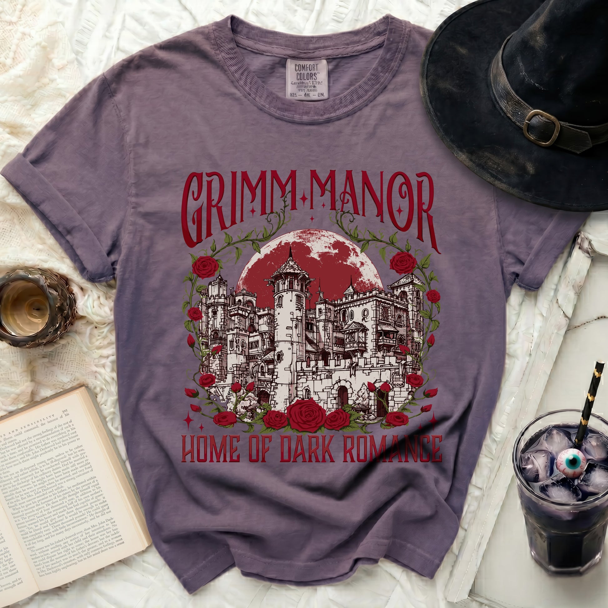 Grimm Manor Home of Dark Romance t-shirt with castle design.