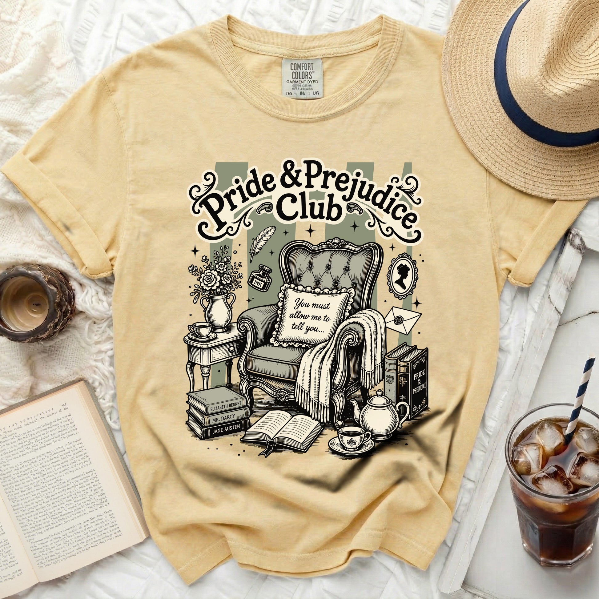 Yellow shirt with "Pride & Prejudice Club" graphic featuring a chair.