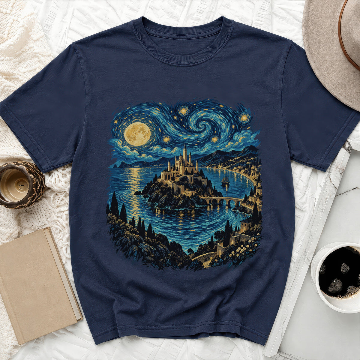 Navy t-shirt with a starry night castle by the water, inspired by Van Gogh.