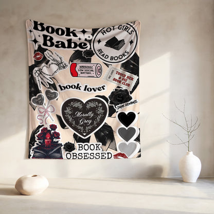Tapestry with "Book Babe," "Hot Girls Read Books," and "Morally Grey" motifs.