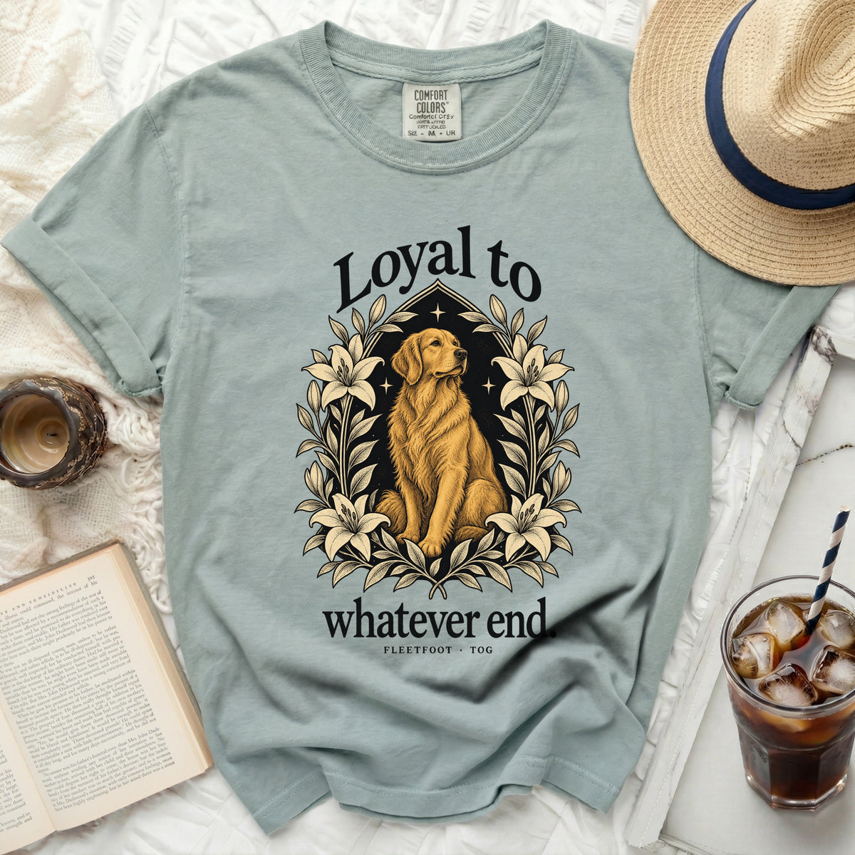 Golden retriever wearing floral wreath with text "Loyal to whatever end"