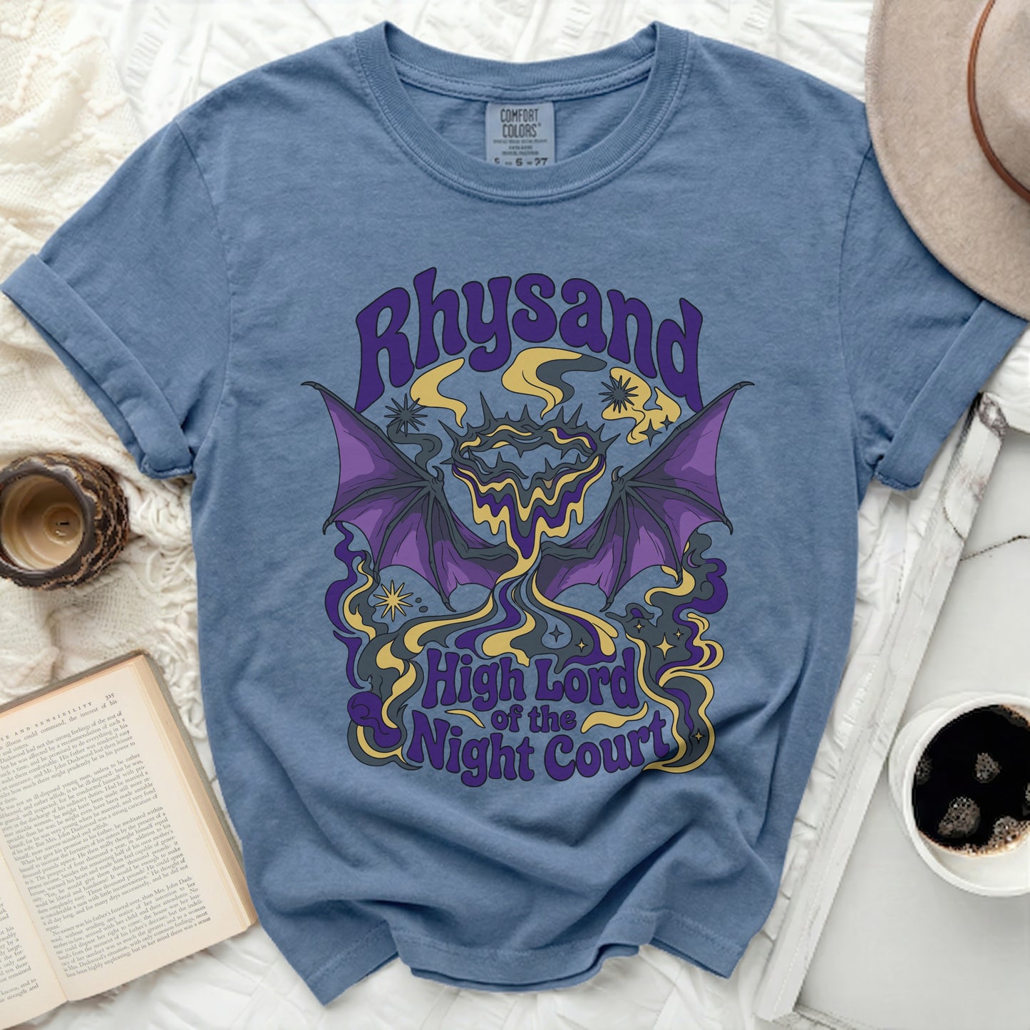 Blue t-shirt with Rhysand, High Lord of the Night Court graphic and bat wings.
