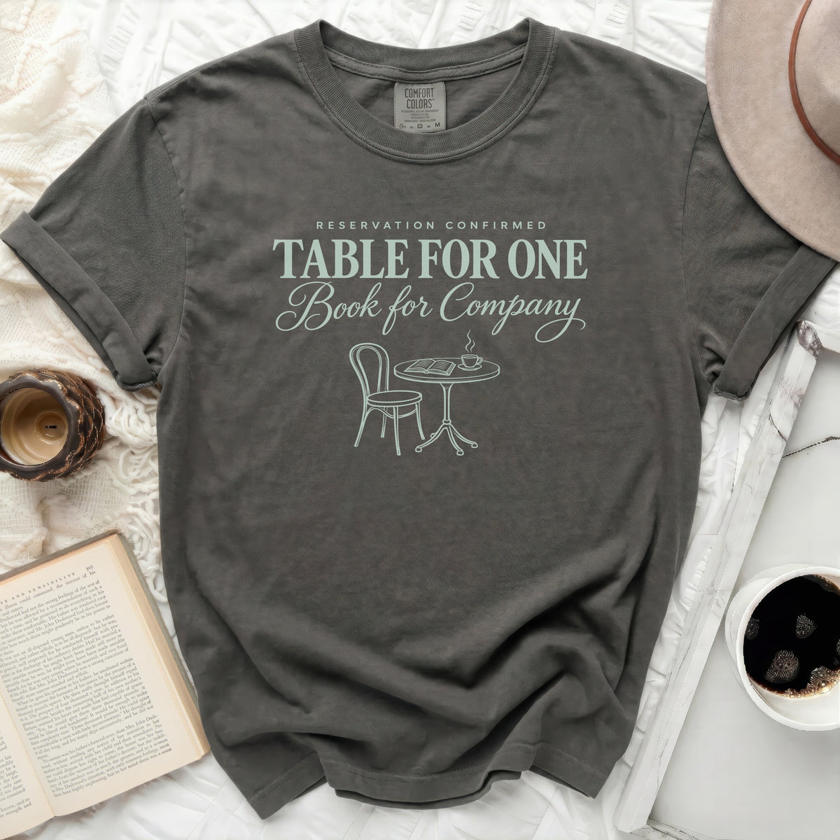 Gray t-shirt with text "Reservation Confirmed, Table for One, Book for Company."