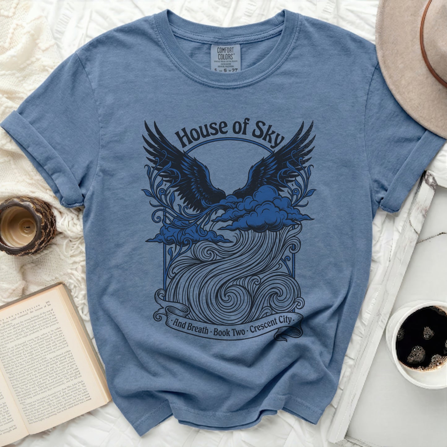 House of Sky and Breath graphic tee with winged design and text.