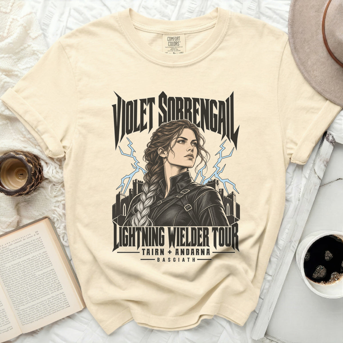 Cream t-shirt with "Violet Sorrengail Lightning Wielder Tour" graphic.