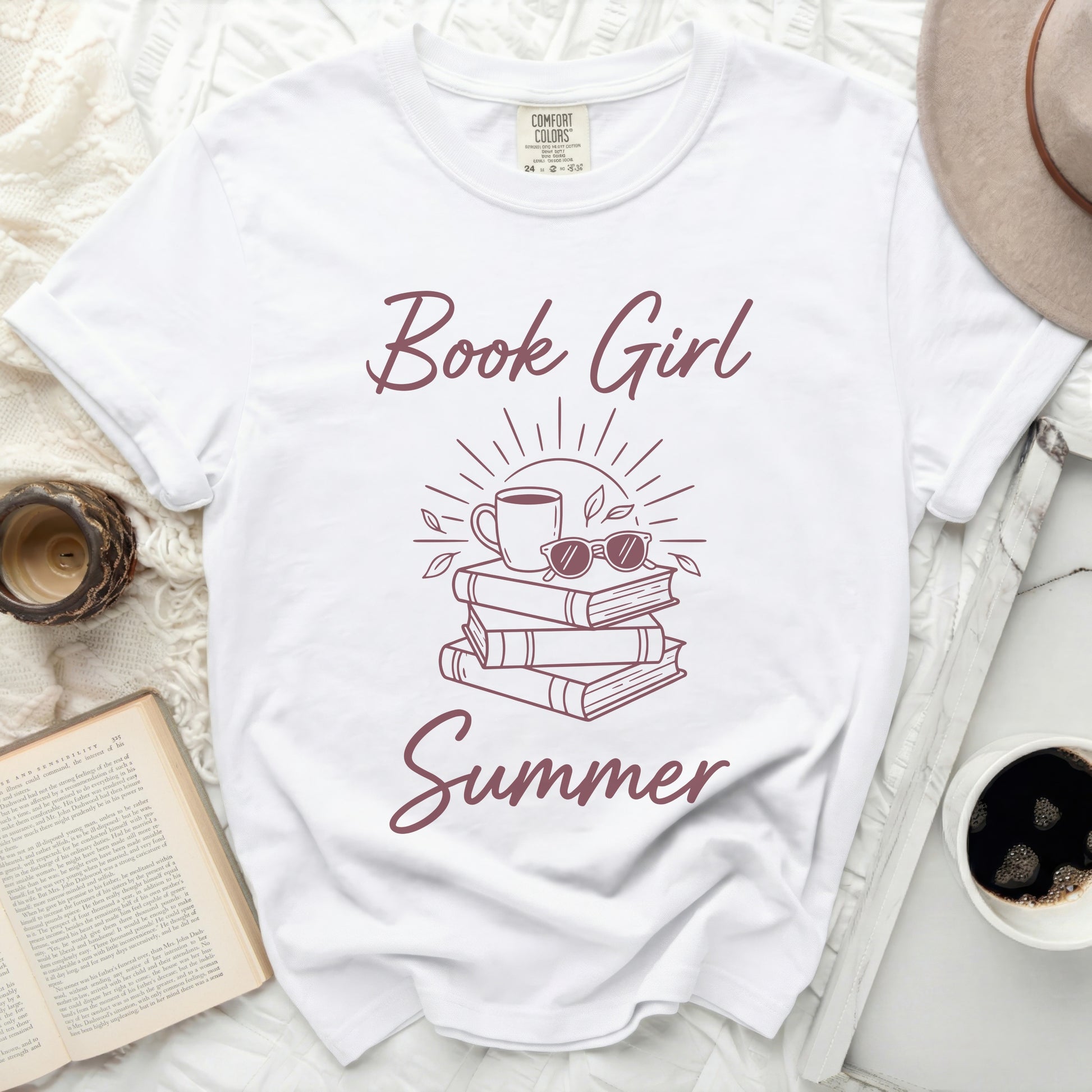 White t-shirt with "Book Girl Summer" text and stacked books graphic.