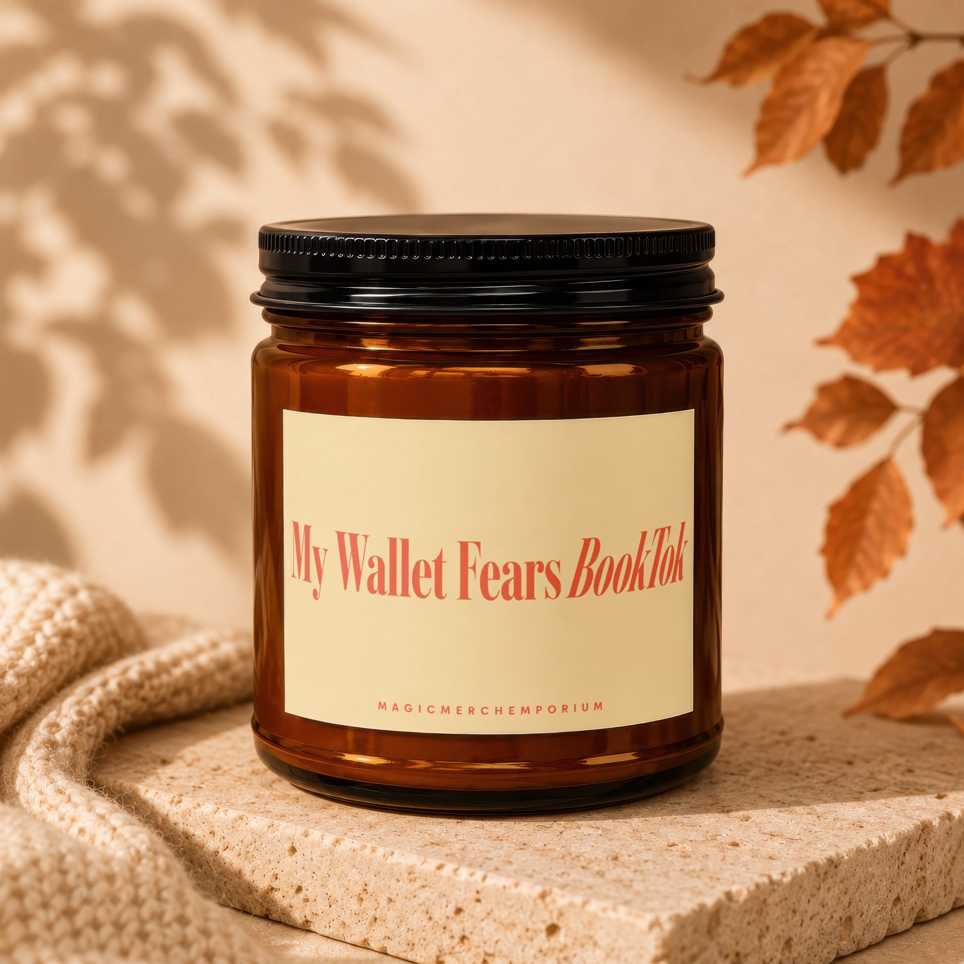 Brown glass candle with "My Wallet Fears BookTok" label on display.