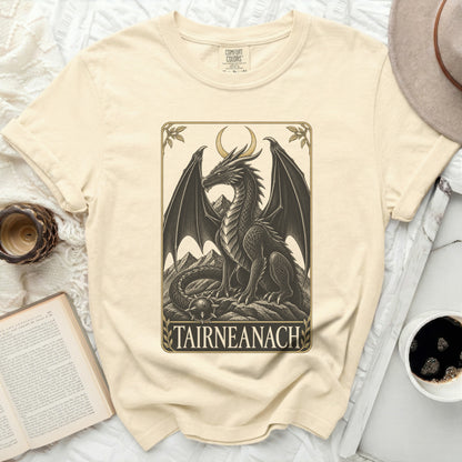 A cream Comfort Colors t-shirt with a black dragon design and text "TAIRNEANACH".