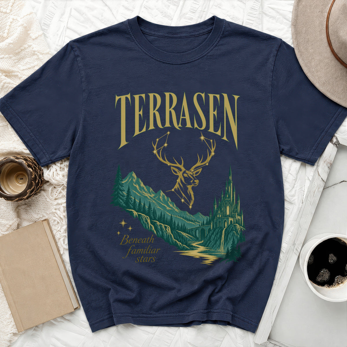 Navy t-shirt with "TERRASEN" text, deer silhouette, castle, and mountains.