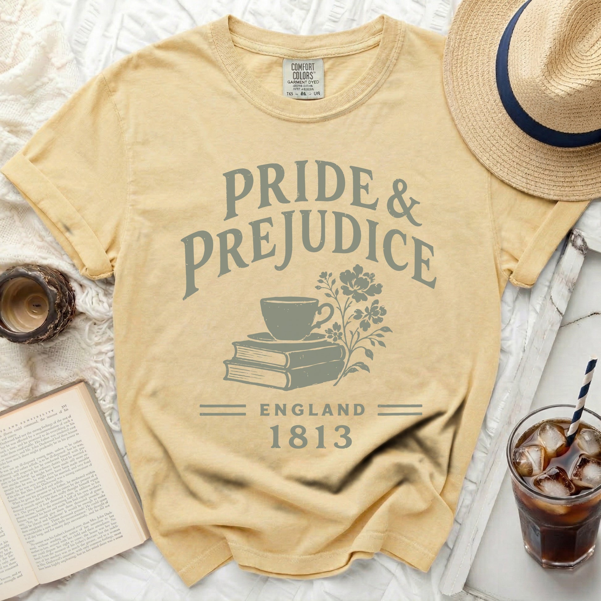 Yellow t-shirt with "Pride & Prejudice England 1813" graphic.