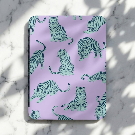 Purple notebook with a repeating pattern of teal tigers in various poses.