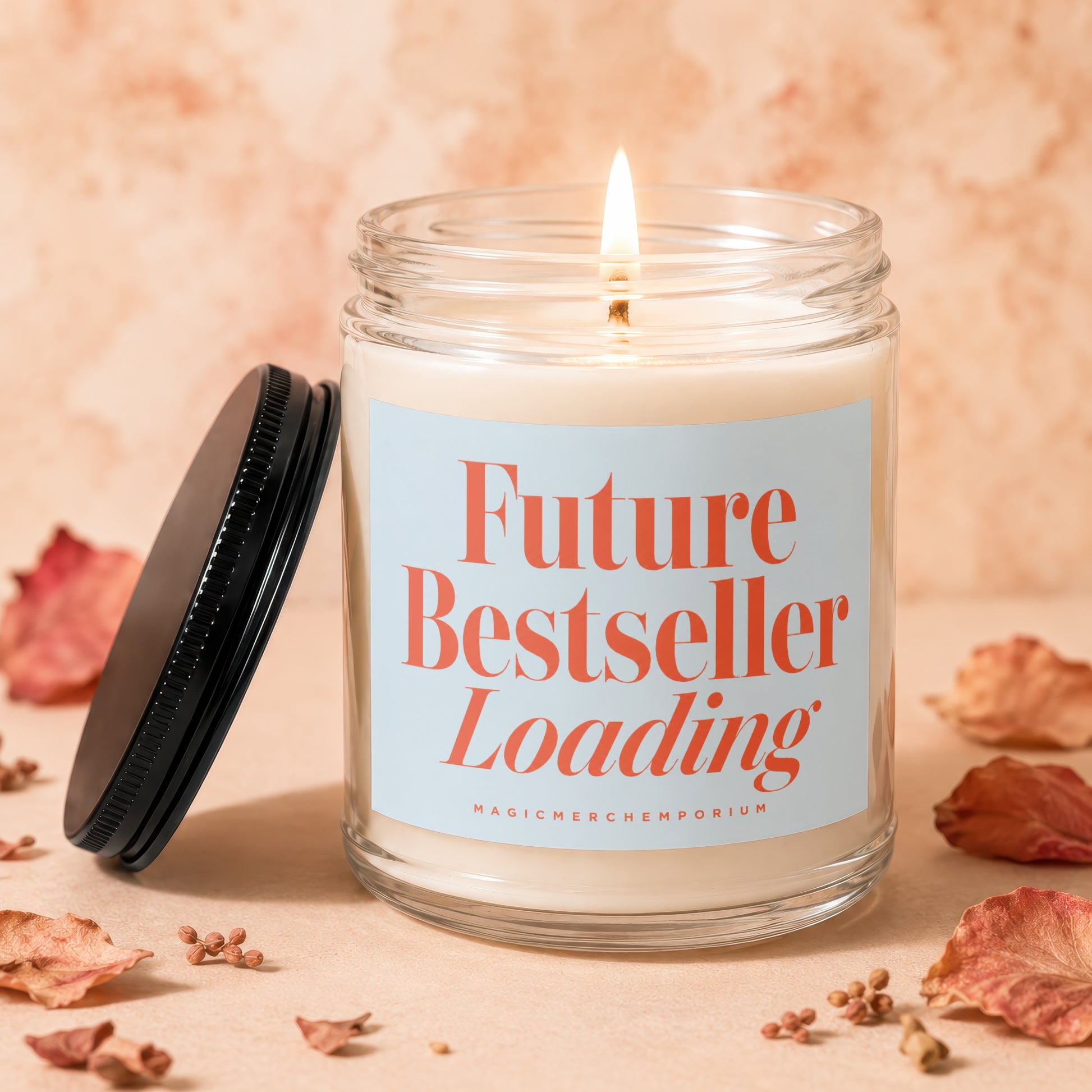 Candle with lit wick and label reading "Future Bestseller Loading".