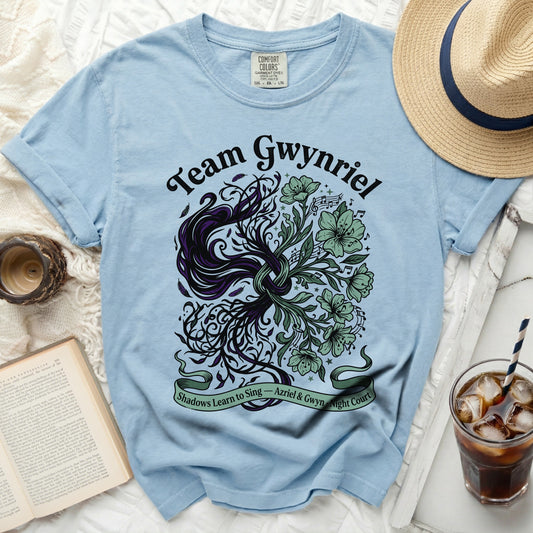 Light blue t-shirt with "Team Gwynriel" and floral design.