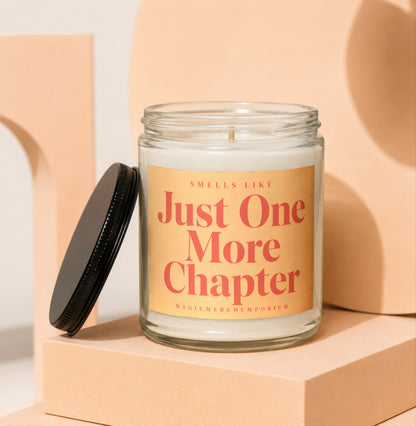 Glass candle with label reading "Smells Like Just One More Chapter"