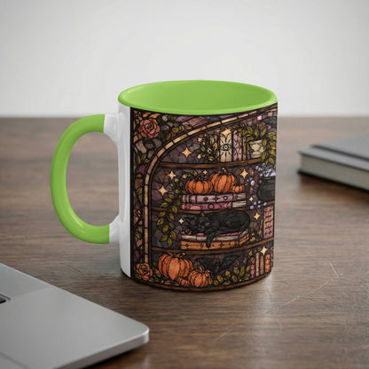 Mug with white body, green handle, and stained-glass design of a black cat.