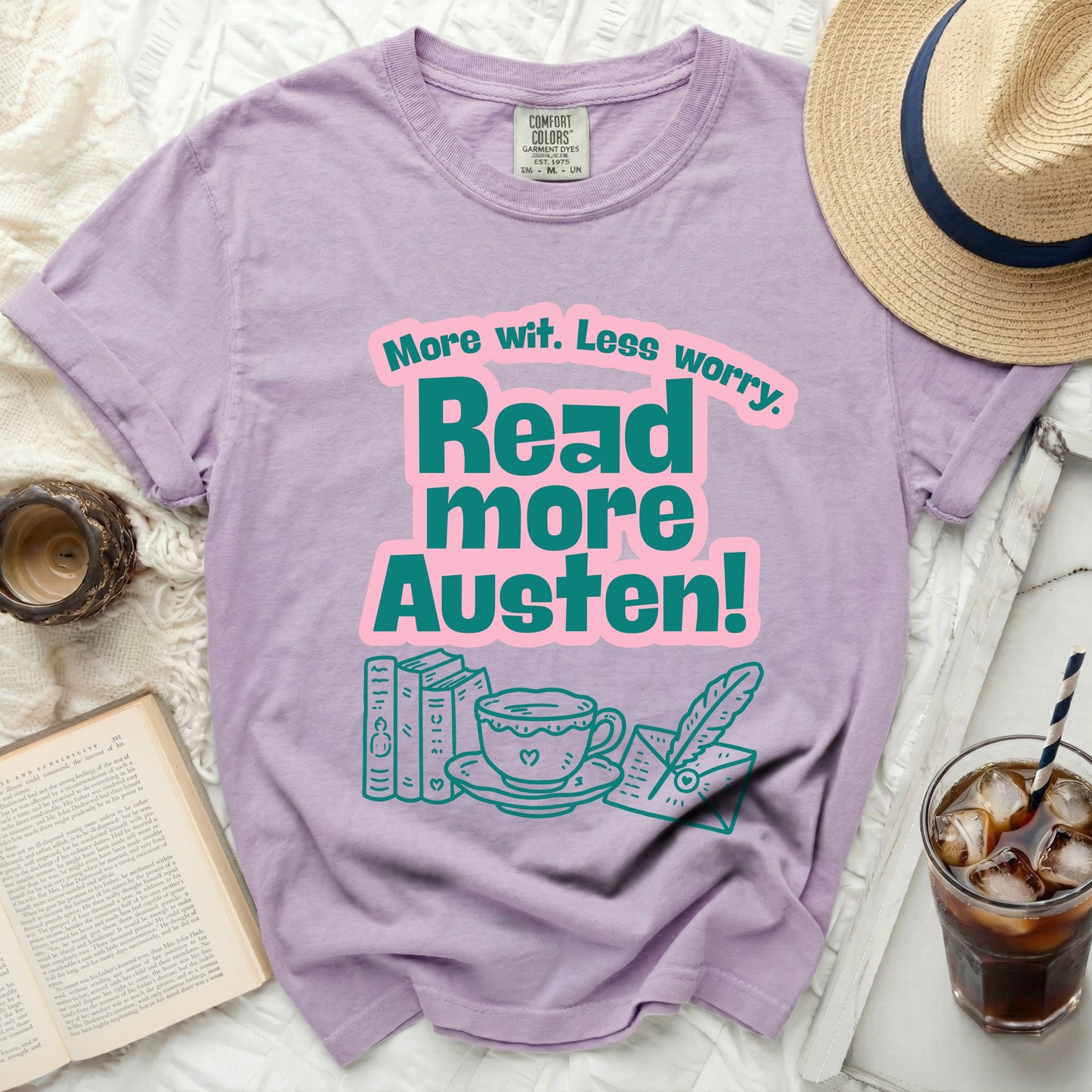 Purple t-shirt with "More wit. Less worry. Read more Austen!" text.