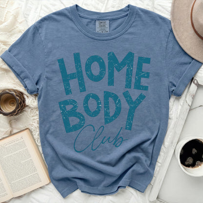 Blue t-shirt with "HOME BODY Club" in teal distressed lettering.