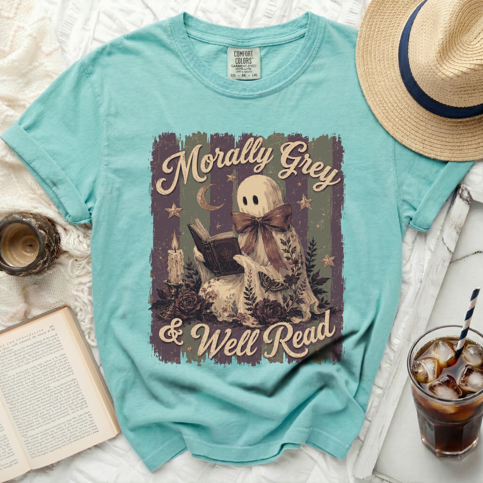 Ghost reading book with text "Morally Grey & Well Read" on shirt.