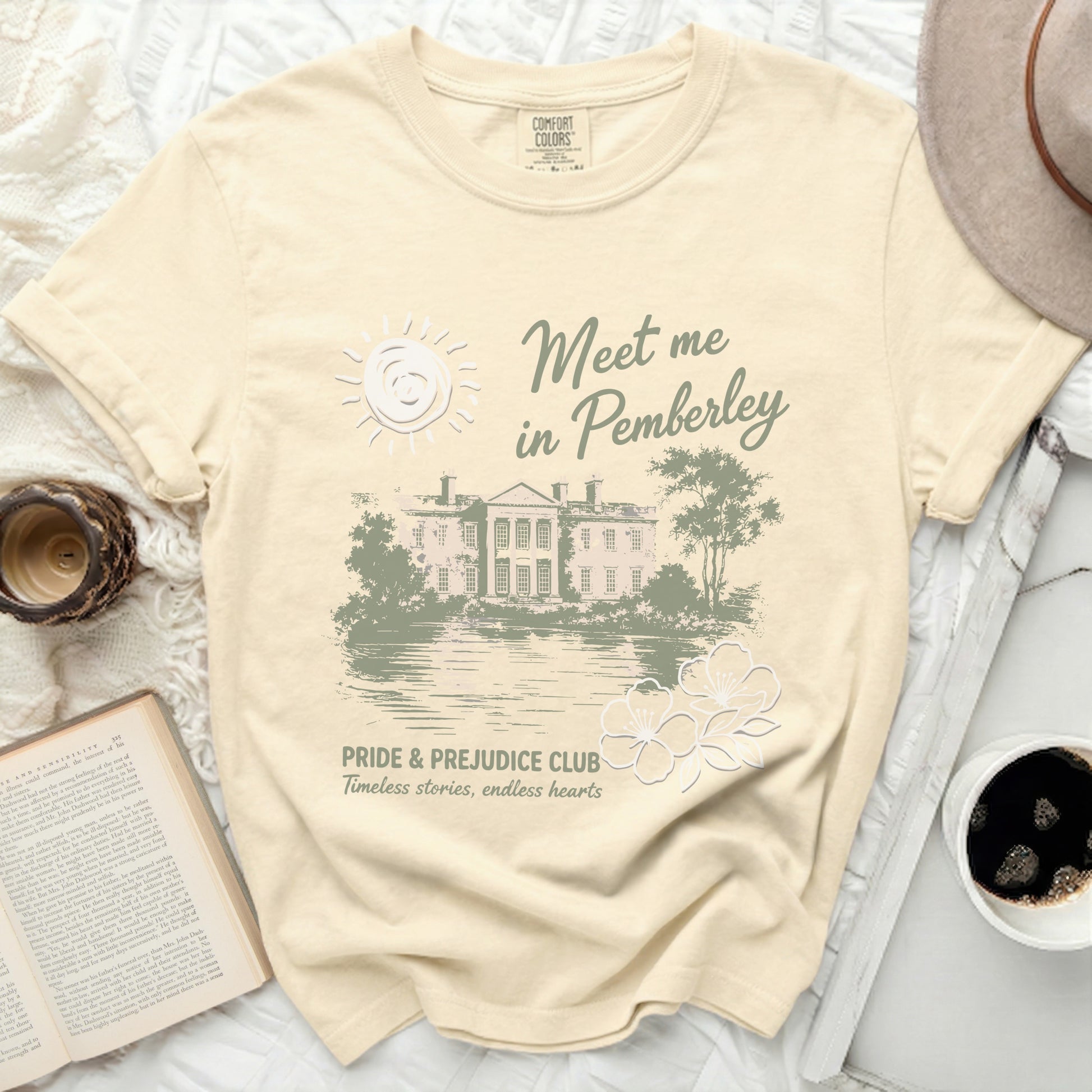 Comfort Colors t-shirt with "Meet me in Pemberley" text and a manor scene.