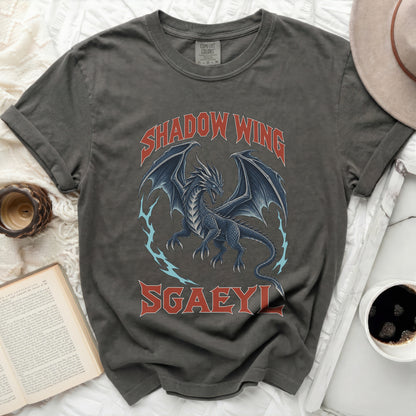 Dark grey t-shirt with a blue dragon and text "Shadow Wing Mgaeyl".