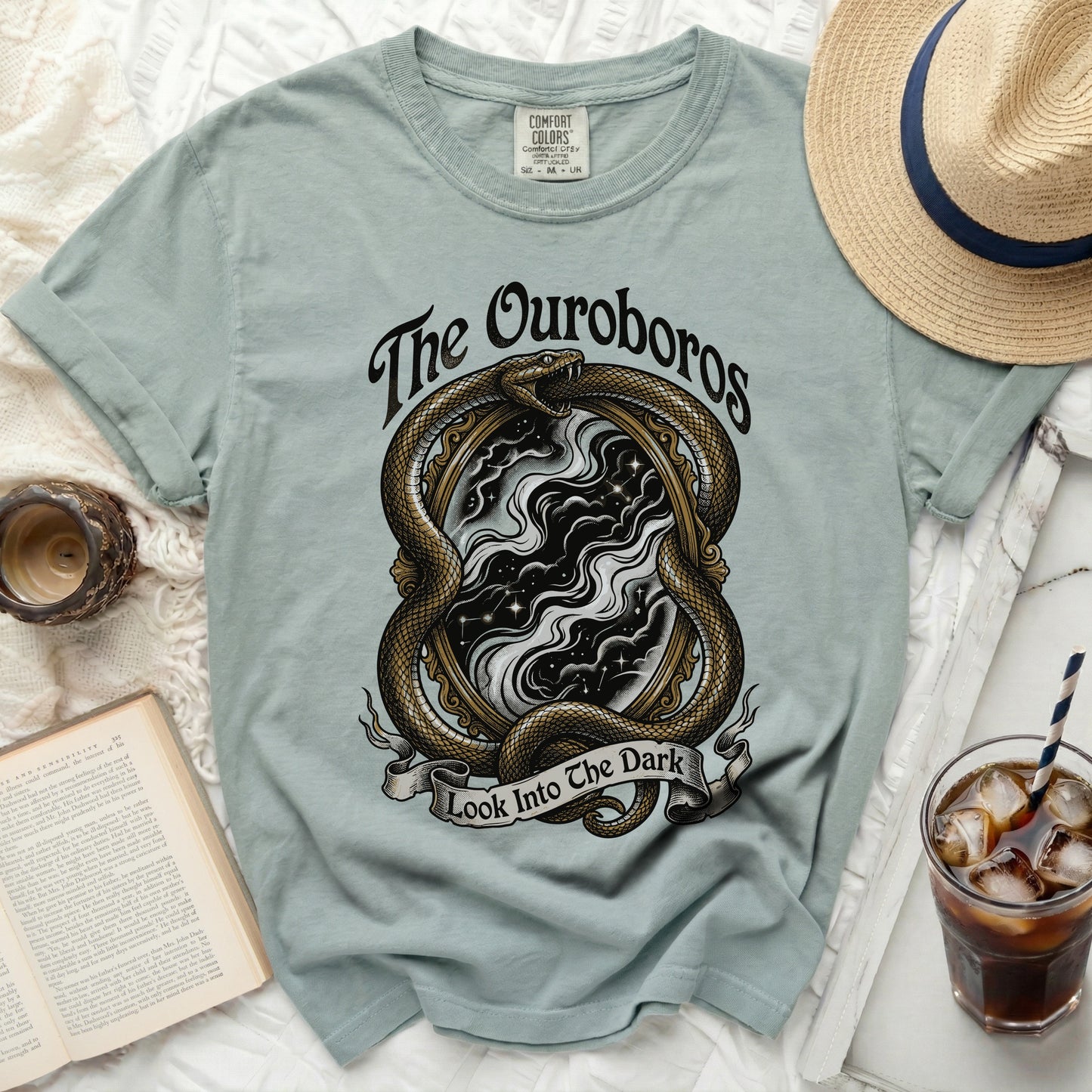 The Ouroboros snake around a mirror with text "Look Into The Dark".