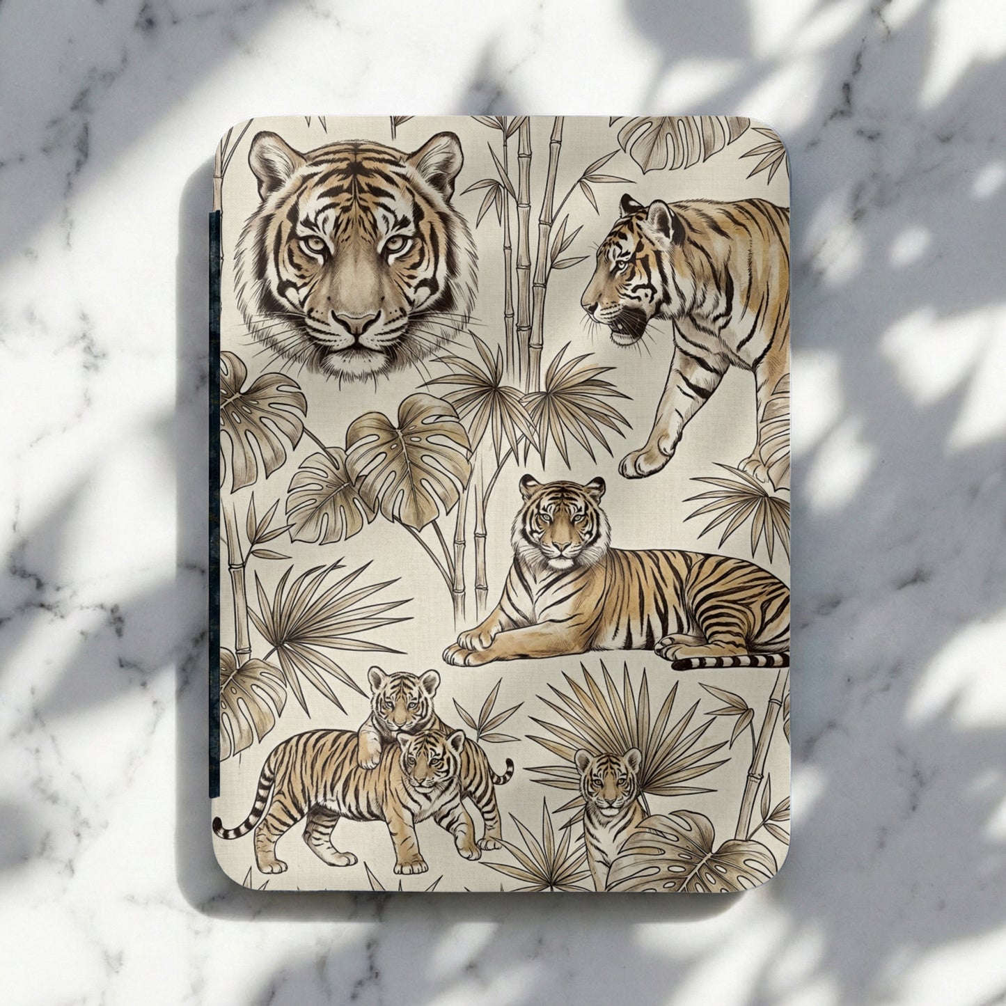 Tiger and foliage pattern on a cream background with a marble surface.